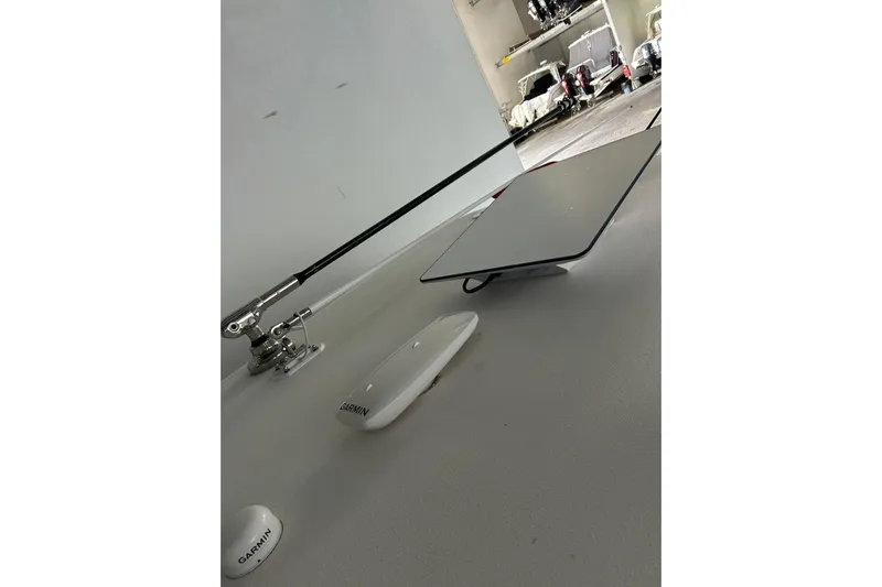  Yacht Photos Pics 2024 Invincible 39 Open Fisherman boat with Garmin equipment and fishing rod setup.