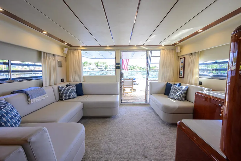 Sea Hawk Yacht Photos Pics Luxurious interior of a 1997 Fairline Squadron yacht with plush seating and scenic views.