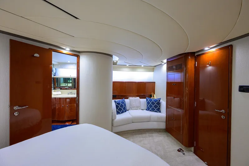 Sea Hawk Yacht Photos Pics Luxurious interior of a 1997 Fairline Squadron yacht with elegant wood finishes.