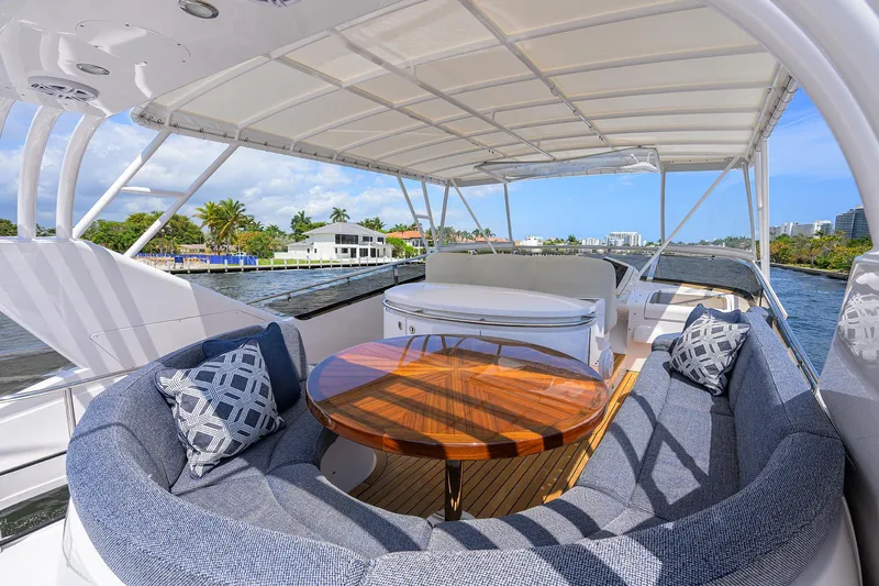 Sea Hawk Yacht Photos Pics Luxurious 1997 Fairline Squadron yacht with spacious outdoor seating and scenic water views.