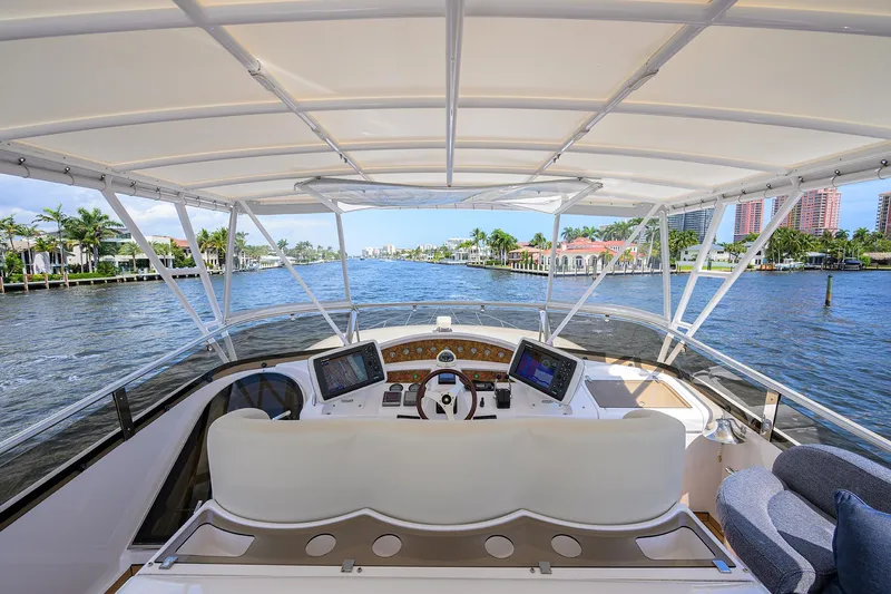 Sea Hawk Yacht Photos Pics 1997 Fairline Squadron yacht helm with waterfront view.