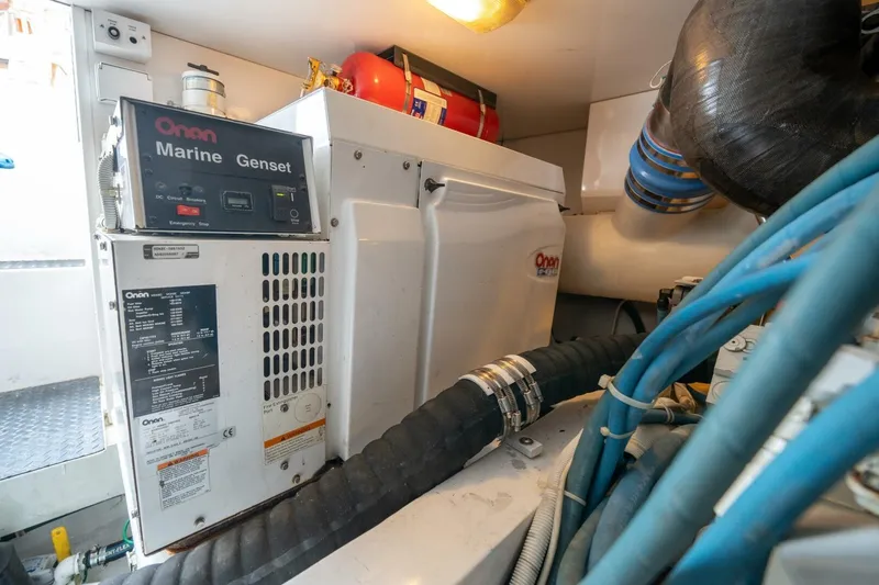  Yacht Photos Pics Engine room of 2005 Viking 52 Convertible with Onan Marine Genset.