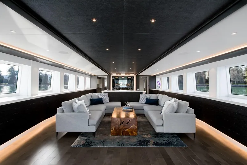 Crescent Lady Yacht Photos Pics Luxurious interior of 2019 Crescent Semi-Displacement yacht with modern sofas and panoramic windows.
