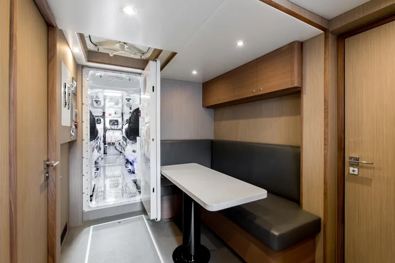 Crescent Lady Yacht Photos Pics Luxurious 2019 Crescent Semi-Displacement yacht interior with modern seating and engine room view.