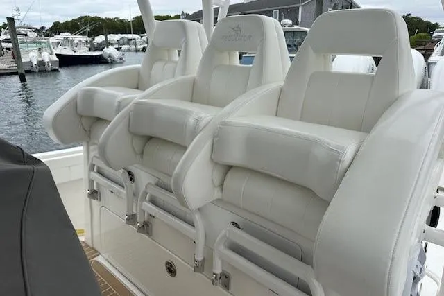  Yacht Photos Pics Luxury seating on 2022 Regulator 41 boat, docked at marina.