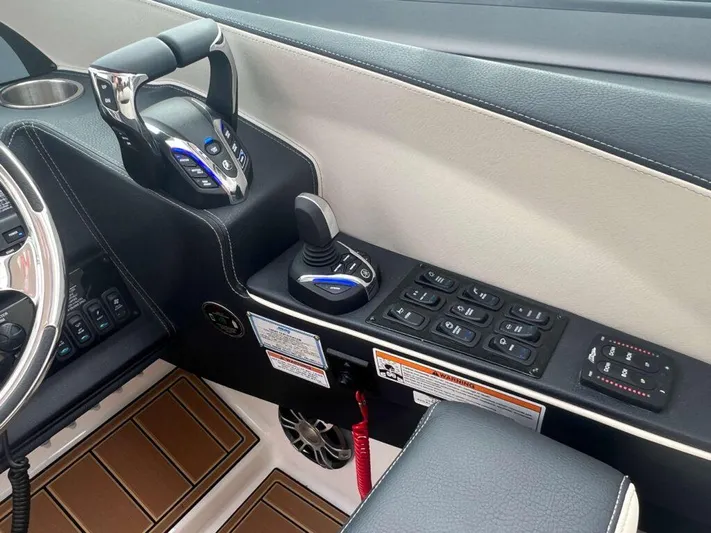  Yacht Photos Pics 2025 Regal 33 OBX boat control panel with joystick and throttle.