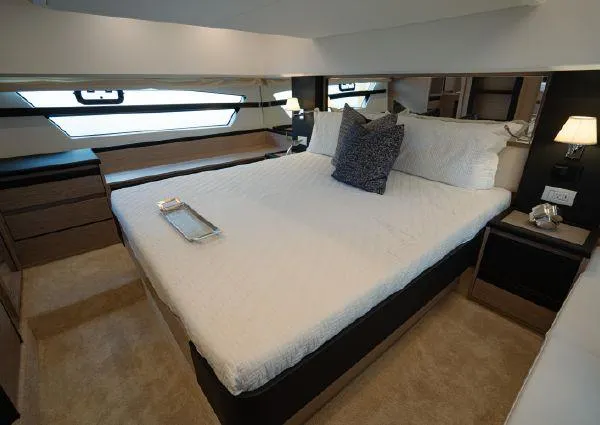  Yacht Photos Pics Luxurious bedroom interior of 2023 Greenline 45 Fly yacht with modern design and cozy bedding.