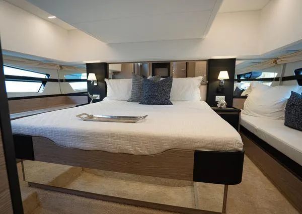  Yacht Photos Pics Luxurious bedroom interior of 2023 Greenline 45 Fly yacht with modern design and cozy bedding.