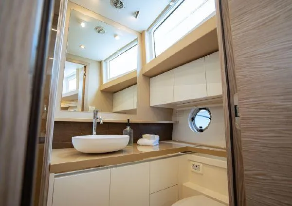  Yacht Photos Pics Luxurious bathroom interior of 2023 Greenline 45 Fly yacht with modern fixtures.