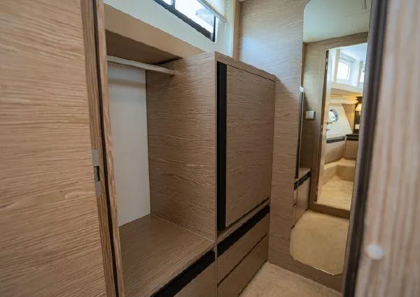  Yacht Photos Pics Luxurious interior of 2023 Greenline 45 Fly yacht with modern wood finish.