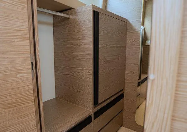  Yacht Photos Pics Modern wooden cabinetry inside 2023 Greenline 45 Fly yacht, showcasing sleek design and ample storage.