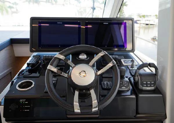  Yacht Photos Pics Helm of 2023 Greenline 45 Fly yacht with dual screens and modern controls.