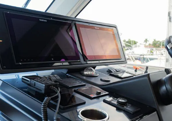  Yacht Photos Pics Control panel of 2023 Greenline 45 Fly yacht with dual screens and navigation equipment.