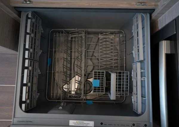  Yacht Photos Pics Open dishwasher inside a 2023 Greenline 45 Fly yacht kitchen.