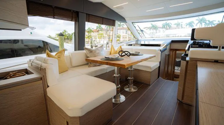  Yacht Photos Pics Luxurious interior of 2023 Greenline 45 Fly yacht with elegant seating and dining area.