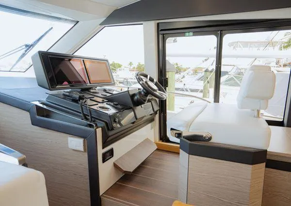  Yacht Photos Pics 2023 Greenline 45 Fly yacht interior with modern helm and seating area.