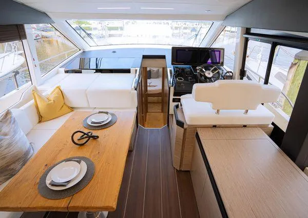  Yacht Photos Pics Luxurious interior of 2023 Greenline 45 Fly yacht with modern helm and dining area.