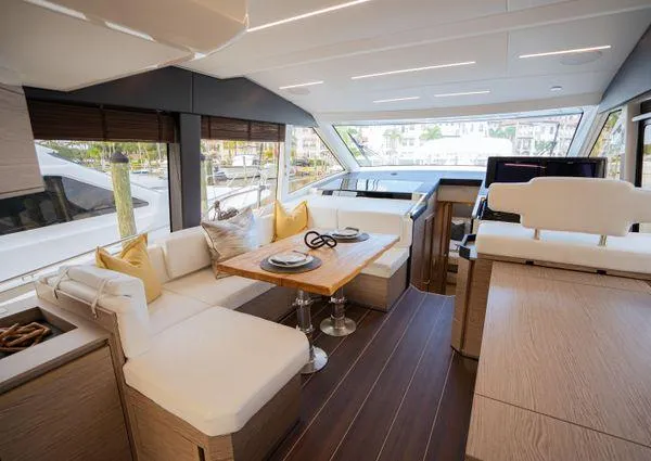  Yacht Photos Pics Luxurious interior of 2023 Greenline 45 Fly yacht with elegant seating and dining area.