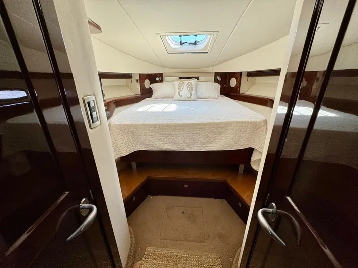 Isabela Yacht Photos Pics Luxurious cabin interior of 2008 Sea Ray 48 Sundancer yacht with elegant bedding.