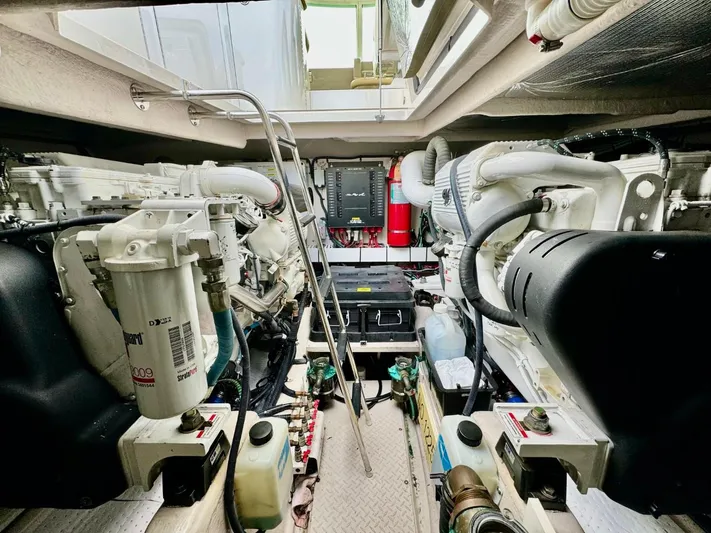 Isabela Yacht Photos Pics Engine room of 2008 Sea Ray 48 Sundancer yacht, featuring dual engines and equipment.