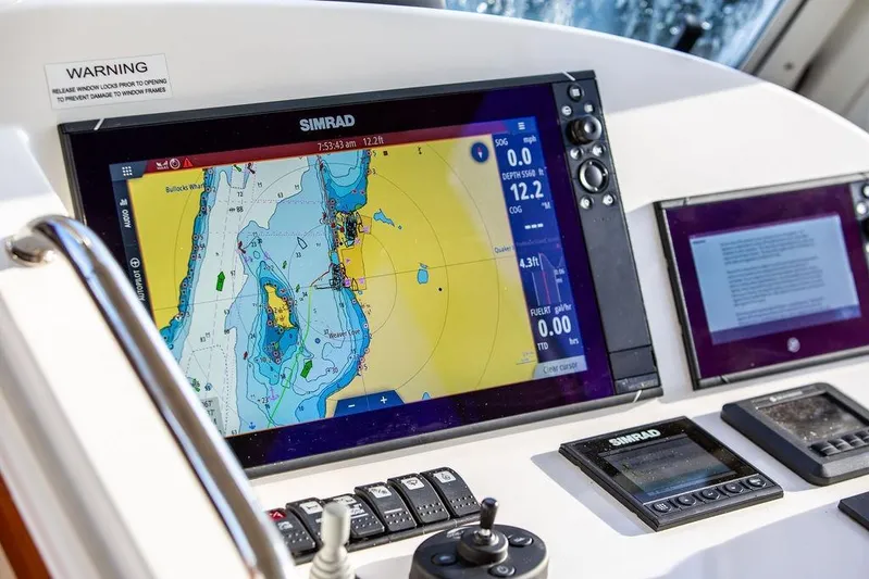 Goombay Yacht Photos Pics Navigation system on 2018 MJM 43z yacht, featuring Simrad display with nautical chart.