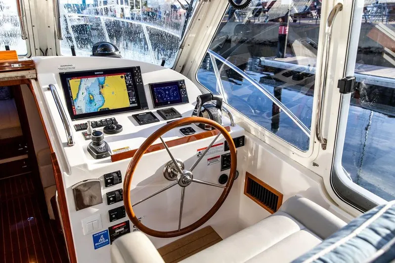 Goombay Yacht Photos Pics Cockpit of 2018 MJM 43z boat with navigation screens and steering wheel.