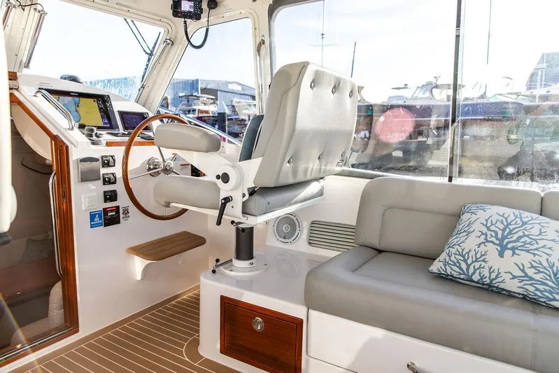 Goombay Yacht Photos Pics Interior of 2018 MJM 43z boat with helm, seating, and navigation equipment.