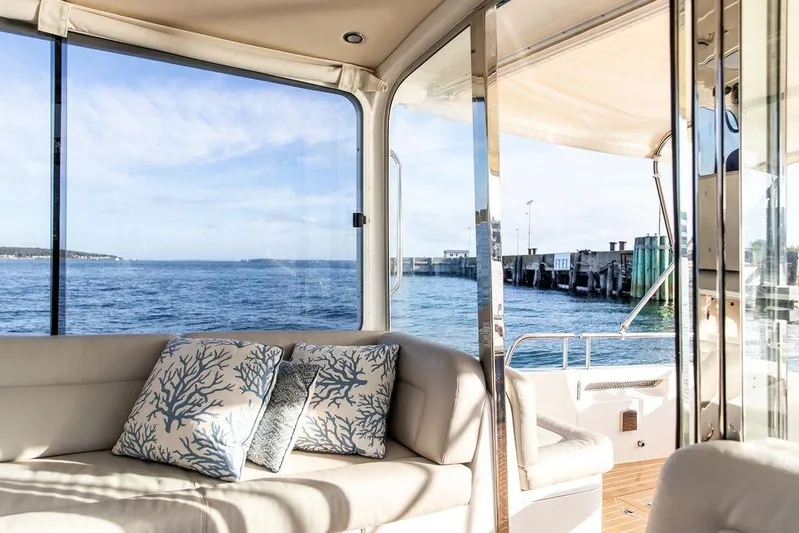 Goombay Yacht Photos Pics Luxurious interior of 2018 MJM 43z yacht with ocean view and stylish cushions.