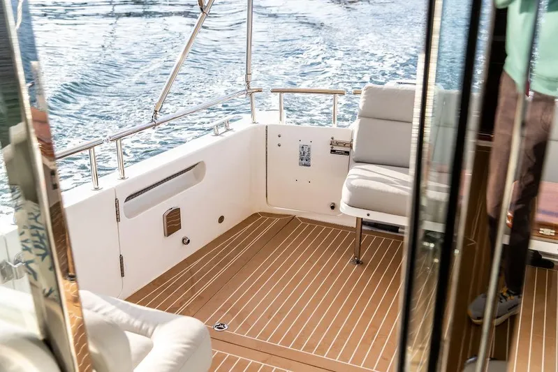 Goombay Yacht Photos Pics Luxurious 2018 MJM 43z yacht interior with comfortable seating and elegant wood flooring.