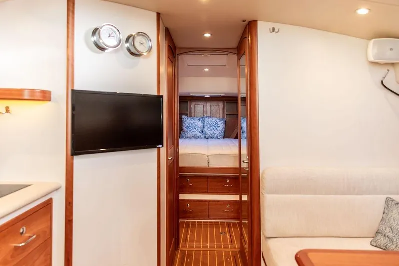 Goombay Yacht Photos Pics Luxurious interior of 2018 MJM 43z yacht with cozy bedroom and modern amenities.