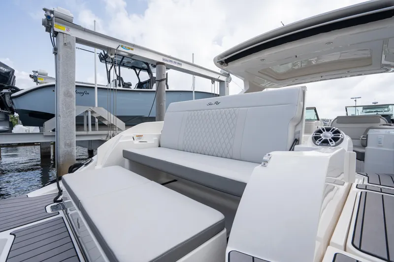  Yacht Photos Pics 2023 Sea Ray 350 Sundancer boat interior with luxurious seating and modern design.