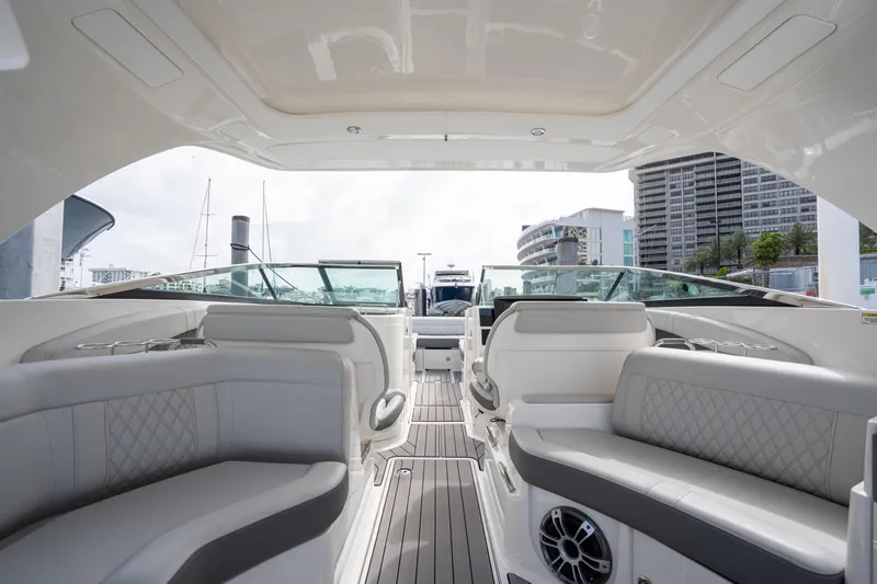  Yacht Photos Pics 2023 Sea Ray 350 Sundancer interior with luxurious seating and modern design.