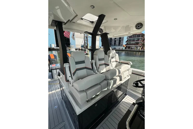  Yacht Photos Pics 2024 Formula 387 Center Console Fish boat interior with luxurious seating and modern design.