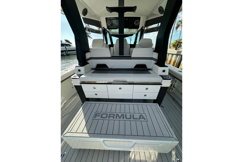  Yacht Photos Pics 2024 Formula 387 Center Console Fish boat interior with seating and storage.