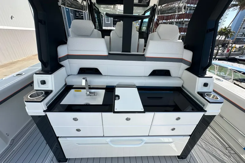  Yacht Photos Pics 2024 Formula 387 Center Console Fish interior with sleek seating and modern amenities.