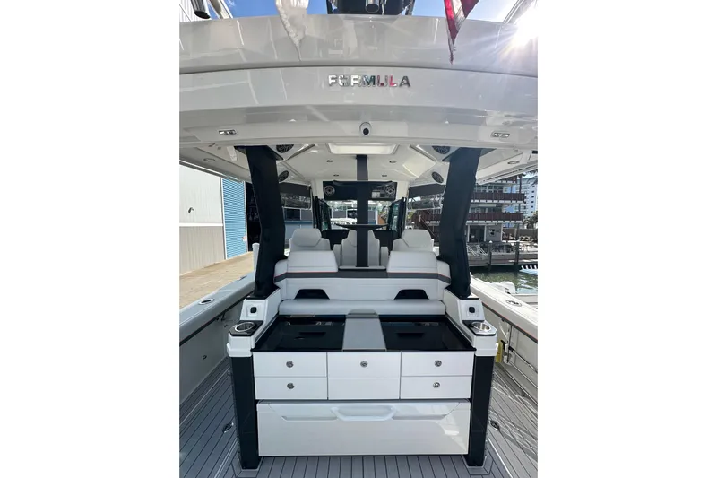 Yacht Photos Pics 2024 Formula 387 Center Console Fish boat interior with seating and storage.