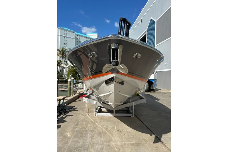  Yacht Photos Pics 2024 Formula 387 Center Console Fish boat docked, showcasing sleek design and modern features.