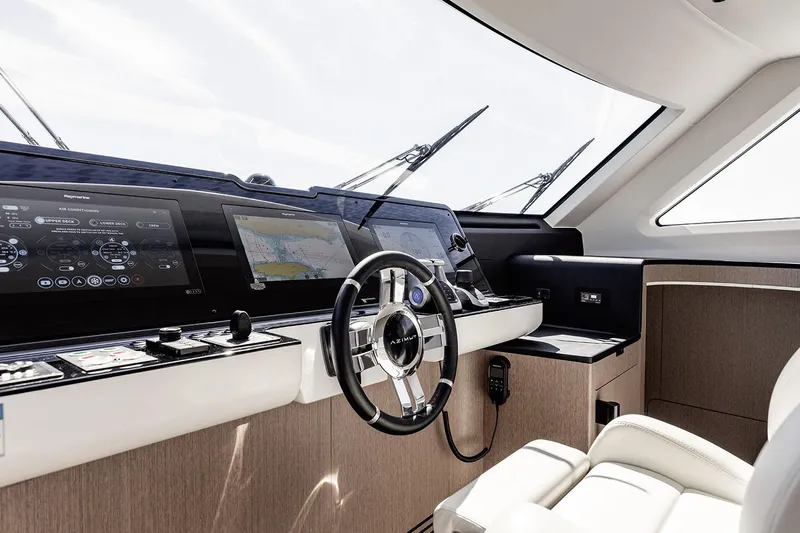  Yacht Photos Pics Luxurious helm of 2025 Azimut 26 Metri yacht with modern navigation systems.