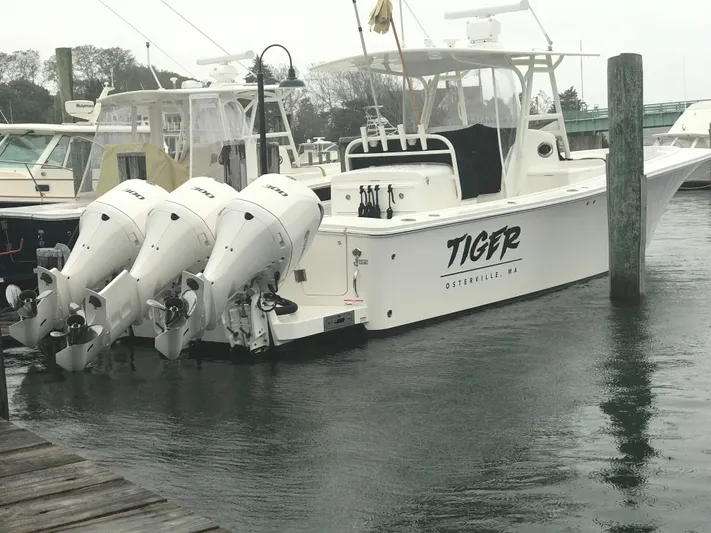Tiger Yacht Photos Pics 2017 Regulator 34SS boat docked with triple outboard engines in Osterville, MA.
