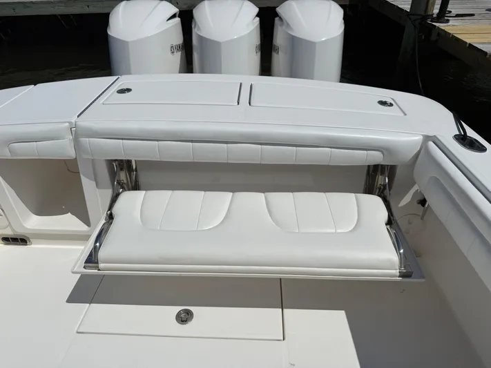 Tiger Yacht Photos Pics 2017 Regulator 34SS boat with foldable white bench seat and Yamaha engines.
