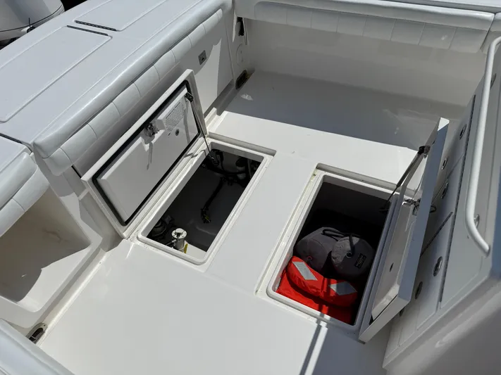 Tiger Yacht Photos Pics 2017 Regulator 34SS boat storage compartments with safety gear and equipment.