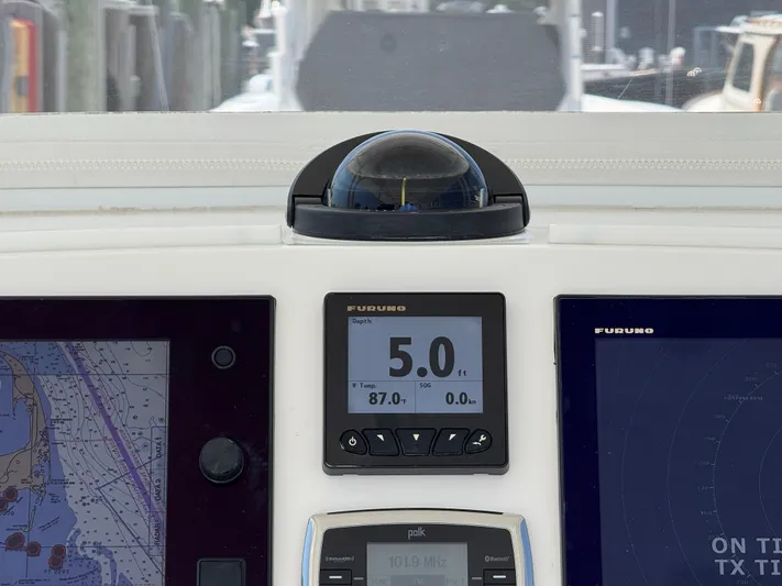 Tiger Yacht Photos Pics Dashboard of a 2017 Regulator 34SS boat with Furuno navigation displays.
