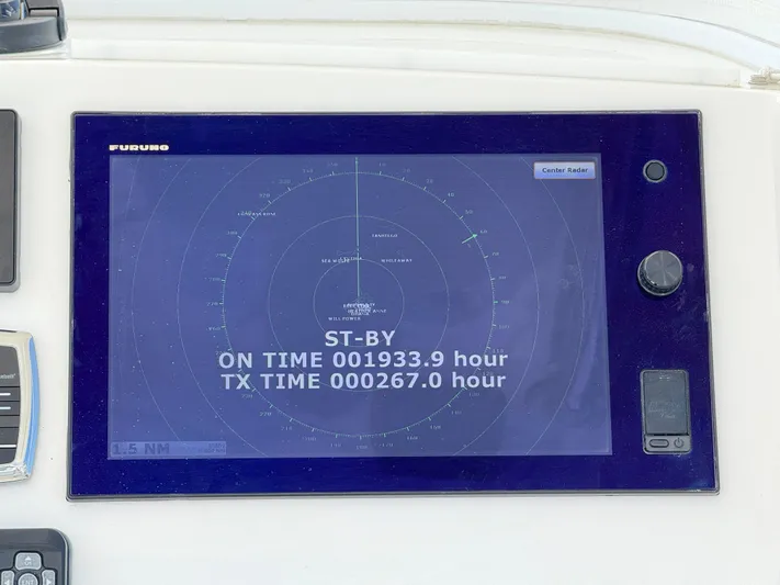 Tiger Yacht Photos Pics Furuno radar display on 2017 Regulator 34SS boat, showing operational hours and standby status.