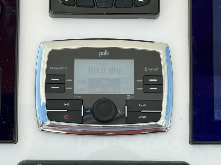 Tiger Yacht Photos Pics Polk audio system on 2017 Regulator 34SS boat, displaying 101.9 MHz frequency.