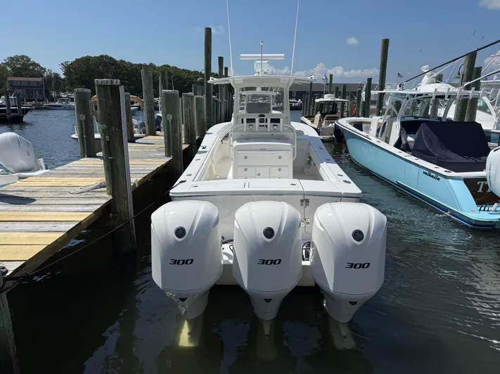 Tiger Yacht Photos Pics 2017 Regulator 34SS boat docked with triple 300 horsepower engines.