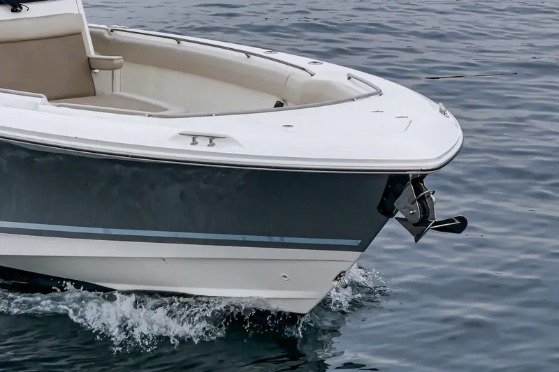  Yacht Photos Pics 2019 Boston Whaler 330 Outrage boat cruising on water.