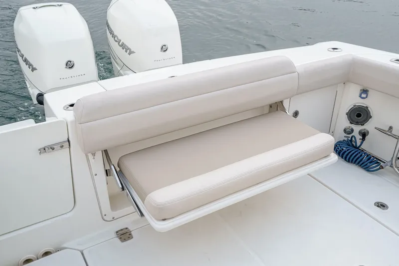  Yacht Photos Pics 2019 Boston Whaler 330 Outrage boat with foldable seating and twin Mercury engines.