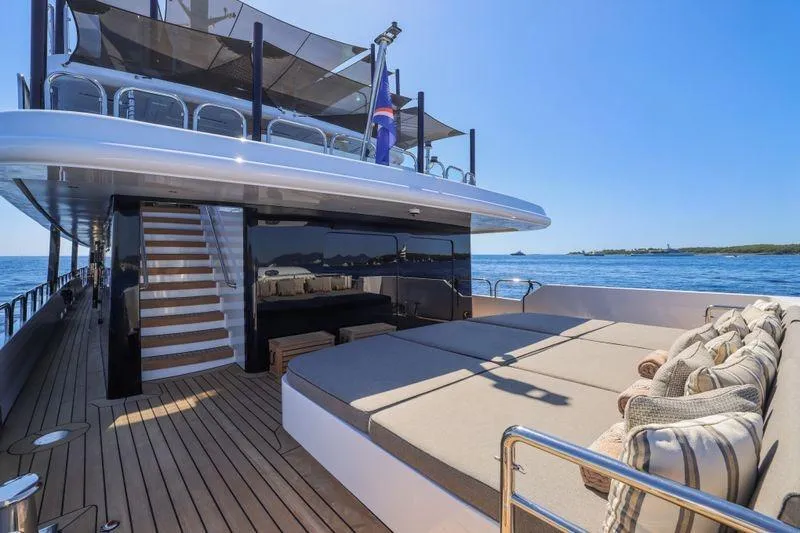 Magna Grecia Yacht Photos Pics Luxurious 1986 Elsflether Werft AG custom yacht with spacious deck and sunbathing area.