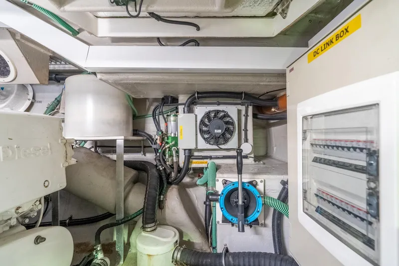 Currency Yacht Photos Pics Engine room of 2009 Sunseeker Manhattan 60 yacht, featuring electrical systems and components.