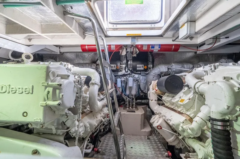 Currency Yacht Photos Pics Engine room of 2009 Sunseeker Manhattan 60 yacht, featuring dual diesel engines.